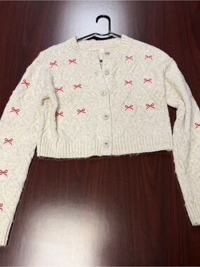 Jessica Simpson Cream Cropped Knit Cardigan with Red Bow Accents